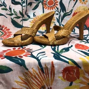 Woven leather 3 inch high heel sandal.